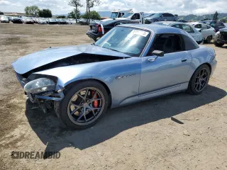 2004 Honda S2000 z VIN JHMAP21454T002150, wystawiony jako Copart lot #54963835 z przebiegiem 143 220 mil mil oraz Szkody całkowita. Historia ofert i sprzedaży dostępna na DreamBid. Obrazek 1.