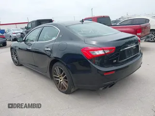 2016 Maserati Ghibli S Q4 with VIN ZAM57RTA3G1178723, listed as a IAAI auction lot 42041935 with 129,647 mi miles and . Bid and sale history available at DreamBid. Image 3.