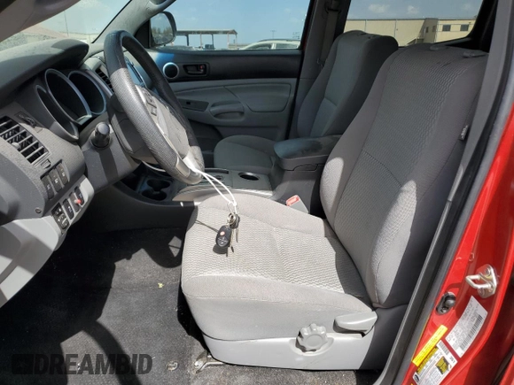 2014 Toyota Tacoma with VIN 3TMLU4EN3EM156907, listed as a Copart auction lot 49350155 with 71,361 mi miles and Salvage Title. Bid and sale history available at DreamBid. Image 7.