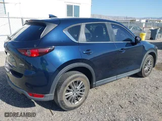 2017 Mazda CX-5 Touring with VIN JM3KFACL5H0180243, listed as a IAAI auction lot 41990818 with 158,977 mi miles. Bid and sale history available at carsss.com. Image 4.