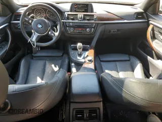 2015 BMW 4 Series 428i xDrive with VIN WBA4A7C58FD413734, listed as a Copart auction lot 50252325 with 74,629 mi miles and Salvage title. Bid and sale history available at DreamBid. Image 8.