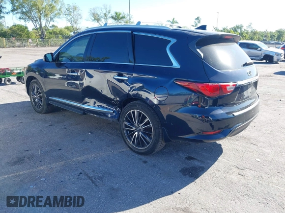 2016 Infiniti QX60 with VIN 5N1AL0MN4GC532048, listed as a IAAI auction lot 41832885 with 125,306 mi miles and . Bid and sale history available at DreamBid. Image 3.