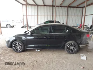 2012 Volkswagen Jetta Sedan SEL w/Sunroof with VIN 3VWLX7AJ5CM379634, listed as a IAAI auction lot 41634048 with 209,586 mi miles. Bid and sale history available at carsss.com. Image 15.