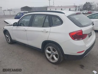 2013 BMW X1 xDrive35i with VIN WBAVM5C53DVV89288, listed as a IAAI auction lot 41609285 with 114,659 mi miles. Bid and sale history available at carsss.com. Image 3.