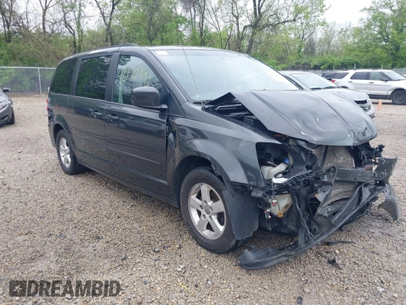2012 Dodge Grand Caravan SXT with VIN 2C4RDGCG7CR236328, listed as a IAAI auction lot 42170991 with 72,831 mi miles and . Bid and sale history available at DreamBid. Image 1.