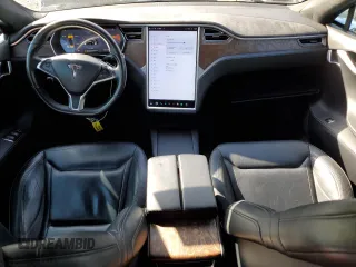 2016 Tesla Model S 90D with VIN 5YJSA1E2XGF150490, listed as a Copart auction lot 51070365 with 144,457 mi miles and Salvage Title. Bid and sale history available at DreamBid. Image 8.