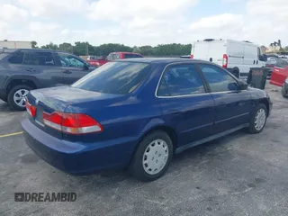 2002 Honda Accord LX with VIN JHMCG56482C014034, listed as a IAAI auction lot 42110164 with 95,657 mi miles and . Bid and sale history available at DreamBid. Image 4.