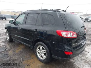 2012 Hyundai Santa Fe GLS with VIN 5XYZG3ABXCG159336, listed as a IAAI auction lot 41635699 with 128,975 mi miles. Bid and sale history available at carsss.com. Image 3.
