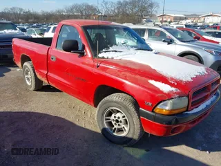 2000 Dodge Dakota z VIN 1B7FL26X5YS516338, wystawiony jako IAAI lot #41609489 z przebiegiem 216 058 mil mil oraz . Historia ofert i sprzedaży dostępna na DreamBid. Obrazek 1.