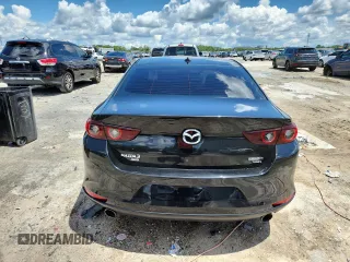 2022 Mazda 3 2.5 Turbo z VIN 3MZBPBAY9NM305244, wystawiony jako Copart lot #63661025 z przebiegiem 89 066 mil mil oraz Czysty tytuł • Clean title. Historia ofert i sprzedaży dostępna na DreamBid. Obrazek 6.