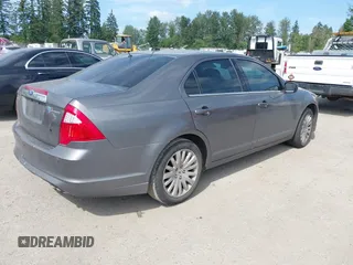 2011 Ford Fusion Hybrid with VIN 3FADP0L34BR226912, listed as a IAAI auction lot 42504379 with 94,107 mi miles and . Bid and sale history available at DreamBid. Image 4.
