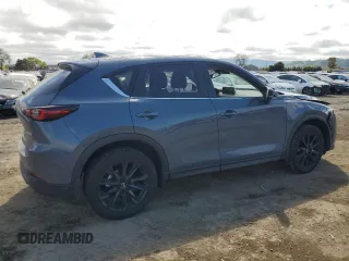 2024 Mazda CX-5 2.5 S Carbon Edition with VIN JM3KFBCL6R0422979, listed as a Copart auction lot 50939695 with 9,974 mi miles and Salvage Title. Bid and sale history available at carsss.com. Image 3.