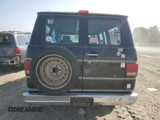 1994 Chevrolet Chevy Van z VIN 1GBEG25K3RF178166, wystawiony jako Copart lot #69173594 z przebiegiem 143 577 mil mil oraz Szkody całkowita. Historia ofert i sprzedaży dostępna na DreamBid. Obrazek 6.