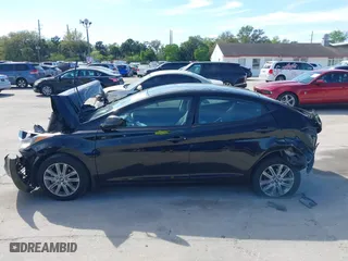 2014 Hyundai Elantra SE with VIN KMHDH4AE3EU142351, listed as a IAAI auction lot 41751974 with 144,139 mi miles. Bid and sale history available at carsss.com. Image 14.