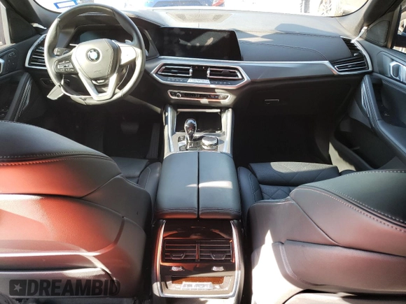 2023 BMW X6 xDrive40i z VIN 5UXCY6C04P9P46153, wystawiony jako Copart lot #81151634 z przebiegiem Nie podano mil oraz Szkoda całkowita • Salvage title. Historia ofert i sprzedaży dostępna na DreamBid. Obrazek 8.