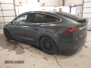 2016 Tesla Model X 70D with VIN 5YJXCBE2XGF025303, listed as a IAAI auction lot 41558869 with 77,793 mi miles and . Bid and sale history available at DreamBid. Image 3.
