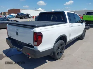2023 Honda Ridgeline Black Edition with VIN 5FPYK3F8XPB009920, listed as a IAAI auction lot 42086798 with 37,192 mi miles and . Bid and sale history available at DreamBid. Image 4.