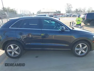 2015 Audi Q3 Premium Plus с VIN WA1EFCFSXFR007096, выставлен на аукционе IAAI как лот 42781603 с пробегом 156 717 миль миль и . История ставок и продаж доступна на DreamBid. Изображение 13.