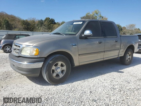 2002 Ford F-150 XLT with VIN 1FTRW07L22KB89313, listed as a Copart auction lot 76680834 with 377,443 mi miles and Salvage Title. Bid and sale history available at DreamBid. Image 1.