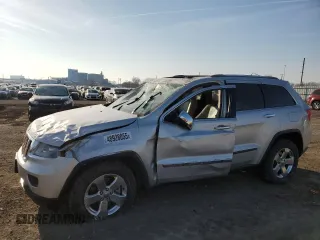 2011 Jeep Grand Cherokee Limited z VIN 1J4RR5GT7BC603808, wystawiony jako Copart lot #48928055 z przebiegiem 129 748 mil mil oraz Szkoda całkowita • Salvage title. Historia ofert i sprzedaży dostępna na DreamBid. Obrazek 1.