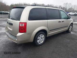 2008 Dodge Grand Caravan SE with VIN 1D8HN44H28B173855, listed as a IAAI auction lot 41968151 with 127,183 mi miles and . Bid and sale history available at DreamBid. Image 4.