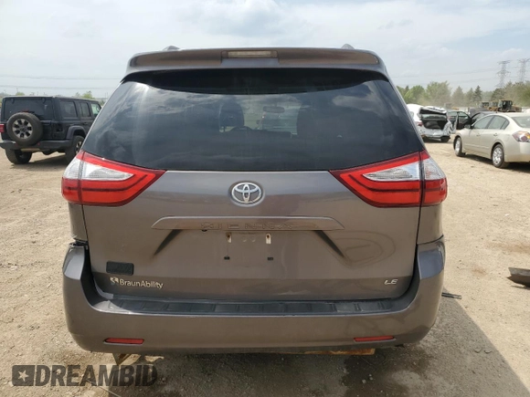 2016 Toyota Sienna LE AAS с VIN 5TDKK3DC7GS763990, выставлен на аукционе Copart как лот 57080655 с пробегом 74 036 миль миль и Списание • Salvage title. История ставок и продаж доступна на DreamBid. Изображение 6.