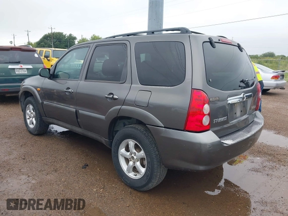 2005 Mazda Tribute S with VIN 4F2YZ04135KM05678, listed as a IAAI auction lot 42194083 with 283,488 mi miles and . Bid and sale history available at carsss.com. Image 3.