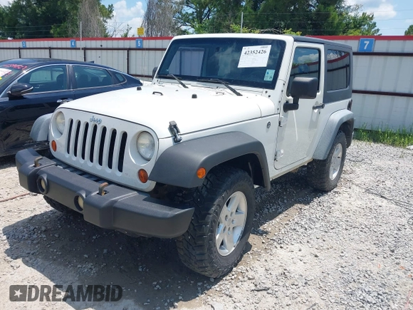 2009 Jeep Wrangler X with VIN 1J4FA24149L781794, listed as a IAAI auction lot 42352426 with 99,128 mi miles and . Bid and sale history available at DreamBid. Image 17.