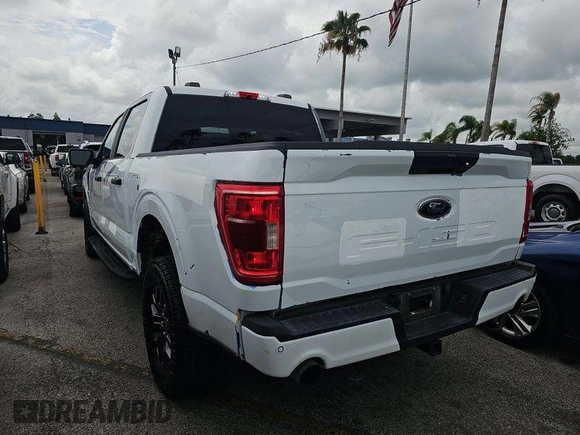 2022 Ford F-150 XL with VIN 1FTEW1E80NFA62236, listed as a IAAI auction lot 42730158 with 91,058 mi miles and . Bid and sale history available at DreamBid. Image 4.