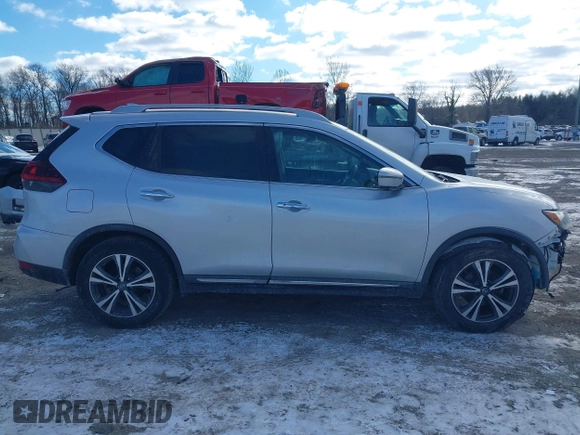 2018 Nissan Rogue S with VIN 5N1AT2MT2JC738034, listed as a IAAI auction lot 41286839 with 125,037 mi miles and . Bid and sale history available at DreamBid. Image 13.