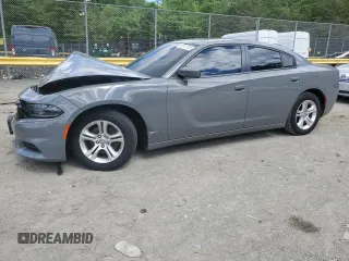 2019 Dodge Charger SXT with VIN 2C3CDXBG6KH713055, listed as a Copart auction lot 55913165 with 115,052 mi miles and Salvage title. Bid and sale history available at DreamBid. Image 1.