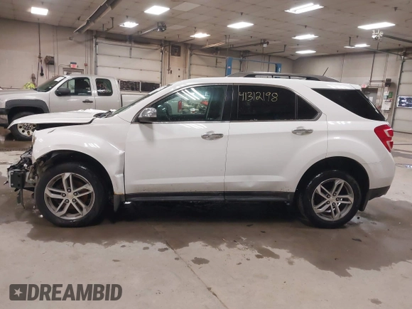 2016 Chevrolet Equinox LTZ with VIN 2GNFLGE32G6176473, listed as a IAAI auction lot 41312198 with 136,123 mi miles. Bid and sale history available at carsss.com. Image 15.