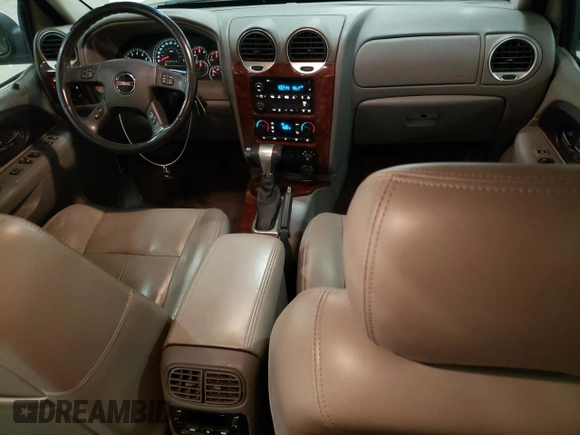 2009 GMC Envoy SLT with VIN 1GKDT43S492124405, listed as a Copart auction lot 81337354 with 154,045 mi miles and Salvage Title. Bid and sale history available at carsss.com. Image 8.
