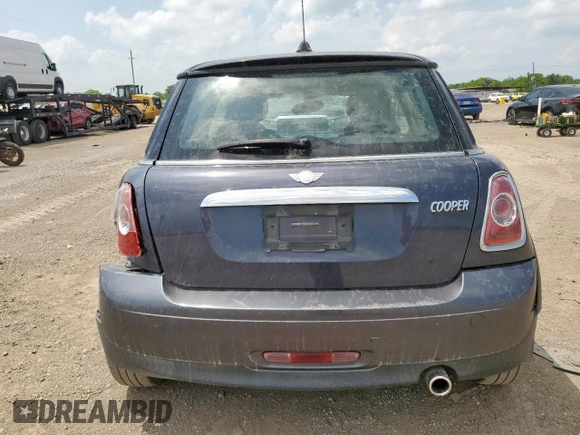 2012 MINI Hardtop z VIN WMWSU3C5XCT261707, wystawiony jako Copart lot #59939565 z przebiegiem 52 509 mil mil oraz Szkoda całkowita • Salvage title. Historia ofert i sprzedaży dostępna na DreamBid. Obrazek 6.