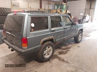 1998 Jeep Cherokee Sport with VIN 1J4FJ68S5WL212555, listed as a IAAI auction lot 42450810 with 257,582 mi miles and . Bid and sale history available at DreamBid. Image 4.
