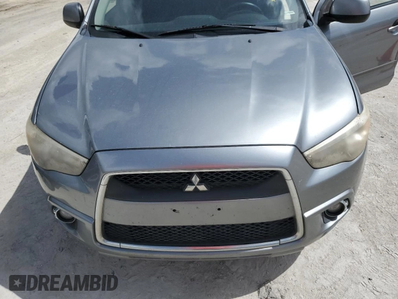 2011 Mitsubishi Outlander SE z VIN JA4AR4AU1BZ011732, wystawiony jako Copart lot #60986055 z przebiegiem Nie podano mil oraz Czysty tytuł • Clean title. Historia ofert i sprzedaży dostępna na DreamBid. Obrazek 12.