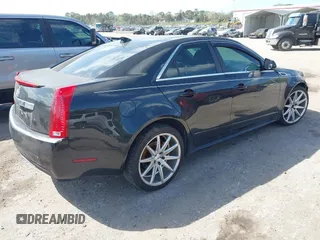 2011 Cadillac CTS Sedan Luxury with VIN 1G6DH5EY8B0116879, listed as a IAAI auction lot 41708842 with 124,550 mi miles. Bid and sale history available at carsss.com. Image 4.