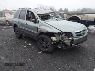 2004 Mazda Tribute LX with VIN 4F2YZ04124KM21238, listed as a IAAI auction lot 41075777 with 344,972 mi miles and . Bid and sale history available at DreamBid. Image 1.