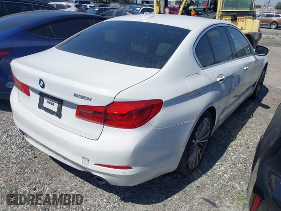 2018 BMW 5 Series 530i with VIN WBAJA5C54JWA39873, listed as a IAAI auction lot 41369709 with 66,353 mi miles and . Bid and sale history available at DreamBid. Image 4.