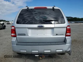 2009 Ford Escape Hybrid z VIN 1FMCU49399KD02275, wystawiony jako Copart lot #55536955 z przebiegiem 50 333 mil mil oraz Szkoda całkowita • Salvage title. Historia ofert i sprzedaży dostępna na DreamBid. Obrazek 6.