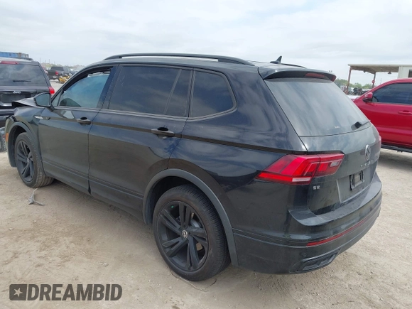 2023 Volkswagen Tiguan SE R-Line Black with VIN 3VVCB7AX0PM122636, listed as a IAAI auction lot 42040494 with 8,589 mi miles and . Bid and sale history available at DreamBid. Image 3.