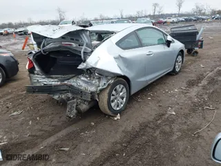 2012 Honda Civic Cpe LX with VIN 2HGFG3A52CH535950, listed as a IAAI auction lot 41496884 with 143,148 mi miles. Bid and sale history available at carsss.com. Image 4.