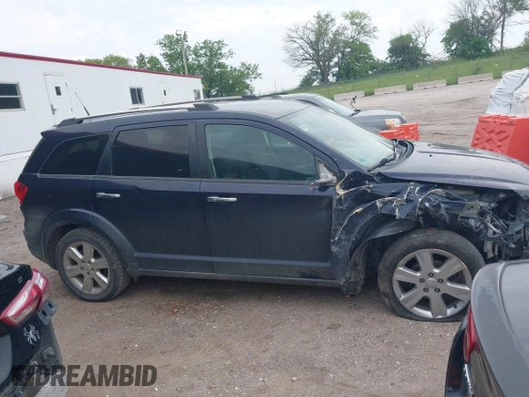 2011 Dodge Journey Crew with VIN 3D4PG3FG5BT505718, listed as a IAAI auction lot 42423904 with 185,902 mi miles and . Bid and sale history available at DreamBid. Image 14.