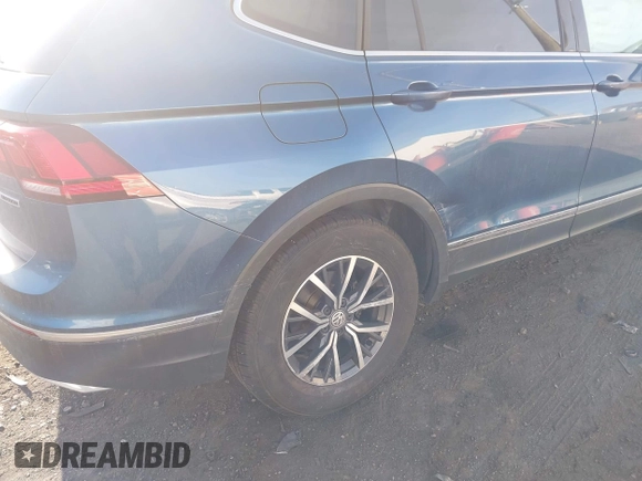 2020 Volkswagen Tiguan SE with VIN 3VV2B7AX2LM017277, listed as a IAAI auction lot 42075052 with 72,248 mi miles and . Bid and sale history available at DreamBid. Image 6.
