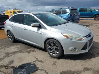2014 Ford Focus SE with VIN 1FADP3F24EL323728, listed as a IAAI auction lot 41826974 with 141,357 mi miles. Bid and sale history available at carsss.com. Image 1.