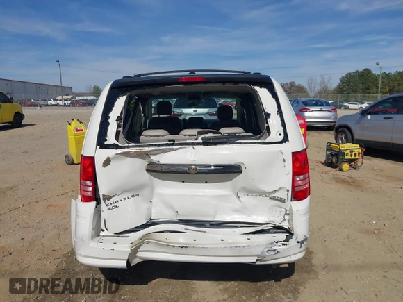 2009 Chrysler Town & Country Touring with VIN 2A8HR54X89R642118, listed as a IAAI auction lot 41844247 with 161,651 mi miles and . Bid and sale history available at DreamBid. Image 16.