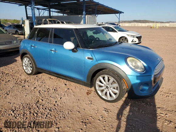 2015 MINI Hardtop 4 Door with VIN WMWXS5C54FT827341, listed as a Copart auction lot 63872395 with 83,023 mi miles and Salvage title. Bid and sale history available at DreamBid. Image 4.
