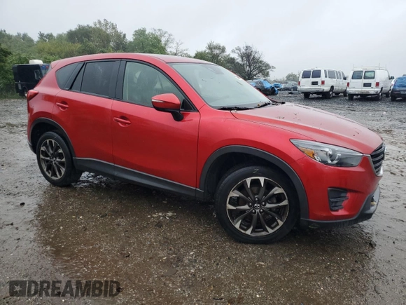 2016 Mazda CX-5 Grand Touring with VIN JM3KE4DY3G0713283, listed as a Copart auction lot 73346194 with 135,382 mi miles and Salvage Title. Bid and sale history available at carsss.com. Image 4.