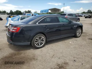2013 Ford Taurus Limited with VIN 1FAHP2F84DG136769, listed as a Copart auction lot 60990765 with 228,994 mi miles and Salvage title. Bid and sale history available at DreamBid. Image 3.