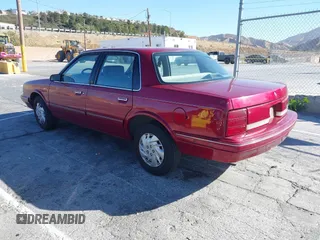 1996 Oldsmobile Cutlass Ciera 1SA VX5 z VIN 1G3AJ55M5T6410109, wystawiony jako IAAI lot #41335804 z przebiegiem 119 240 mil mil oraz . Historia ofert i sprzedaży dostępna na DreamBid. Obrazek 3.
